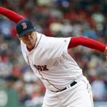 Boston Red Sox relief pitcher Brad Ziegler throws during the ninth inning of the Boston Red Sox 4-0 win over the Tampa Bay Rays in a baseball game at Fenway Park in Boston Sunday, July 10, 2016. (AP Photo/Winslow Townson)