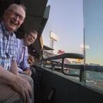 Boston, Ma-July 5, 2016-Sam Kennedy, Red Sox president with his Dad, Rev. Thomas Kennedy at Fenway Park. 