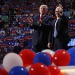 Republican U.S. presidential nominee Donald Trump and vice presidential nominee Governor Mike Pence (R) stand amid balloons onstage at the end of the final session of the Republican National Convention in Cleveland, Ohio, U.S. July 21, 2016. REUTERS/Aaron P. Bernstein