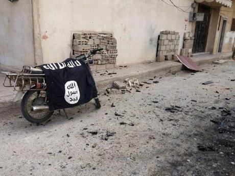 A flag belonging to Islamic State fighters was seen in March after forces loyal to Syrian President Bashar al-Assad recaptured the city of Palmyra. 
