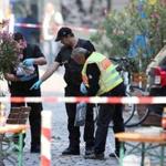 German police investigated the site in Ansbach, Germany, where a failed asylum-seeker from Syria blew himself up and wounded 15 people. 