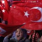 A woman in Taksim Square in Istanbul Monday waved a Turkish flag during a rally protesting the coup attempt in Turkey.