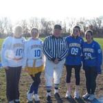 Lee Hutchens stood with students at the annual Norwood High School powder puff game. 