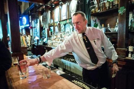 03/09/2016 BOSTON Senior Bartender Kevin Fagan (cq) served drinks at The Black Rose in Boston since 1994. The pub is celebrating it's 40th anniversary this year. (Aram Boghosian for The Boston Globe) 
