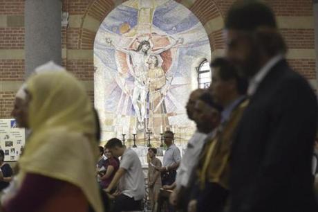 Imams and practicing Muslims attended Mass in Milan?s Santa Maria in Caravaggio church and elsewhere across Italy and France on Sunday.
