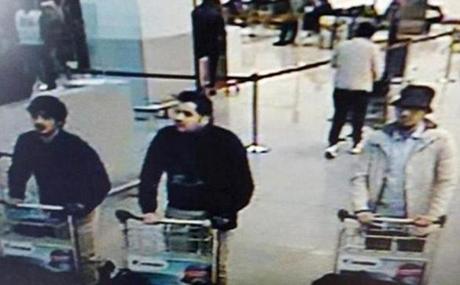 This CCTV image from the Brussels Airport surveillance cameras made available by Belgian Police, shows what officials believe may be suspects in the Brussels airport attack on March 22, 2016. The Belgian state prosecutor said in a press conference on Tuesday, that a photograph of three male suspects was taken at Zaventem. 
