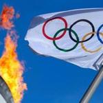 (FILES) This file photo taken on February 12, 2014 shows the Olympic flag fluttering near the Cauldron at the Olympic Park during the 2014 Sochi Winter Olympics. The International Olympic Committee's decision not to ban Russia from the Rio Games over state-run doping left international sports leaders divided on July 25,2016, less than two weeks before the opening ceremony. / AFP PHOTO / ADRIAN DENNISADRIAN DENNIS/AFP/Getty Images