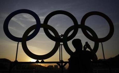 A man photographed the Olympic rings outside of Maracana Stadium ahead of the opening ceremony for the 2016 Summer Olympics in Rio de Janeiro, Brazil, on Friday.
