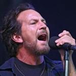 Eddie Vedder, lead singer with Pearl Jam, performed in concert with his band at Fenway Park on Friday. 