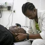 Toya Burton, a chiropractor at Whatley Health Services Inc., treated Robert Prince in Tuscaloosa, Ala.