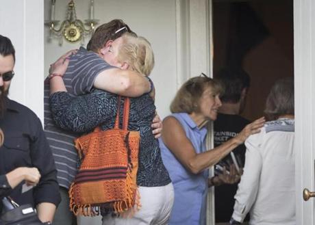 Mourners embraced Tuesday at the First Congressional Church of Princeton during a vigil held for Vanessa Marcotte.
