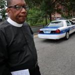 Rev. Mark Scott is among six clergy and civic leaders from the Ella J. Baker House Youth Violence Reduction Taskforce opposing a police union demand that officers be armed with long guns. 