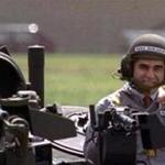 FROM MERLIN ARCHIVE DO NOT RESEND TO LIBRARY Democratic presidential candidate Michael Dukakis gets a free ride in one of General Dynamics' new M1-A-1 battle tanks at its land systems division in Sterling Heights, Mi. Tuesday afternoon September 13, 1988. Dukakis took time out to tell General Dynamics' workers that he's not soft on defense. (AP Photo/Michael Samojeden) prescampaign