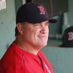 Boston Red Sox manager John Farrell sits in the dug out before a baseball game against the Minnesota Twins in Boston, Sunday, July 24, 2016. (AP Photo/Michael Dwyer)