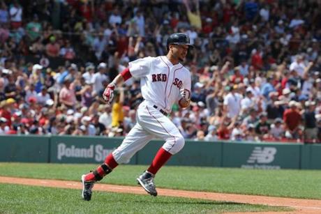 Boston MA 8/14/16 Boston Red Sox Mookie Betts prepares to round first base after hitting a 3 RBI home run his second home run of the game against the Arizona Diamondbacks during second inning action at Fenway Park on Sunday August 14, 2016. (Photo by Matthew J. Lee/Globe staff) 
