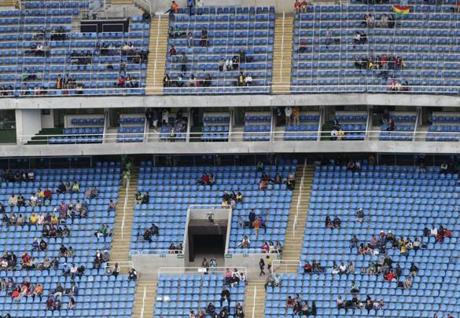 Empty seats are seen in the Olympic stadium during the athletics competitions of the 2016 Summer Olympics at the Olympic stadium in Rio de Janeiro, Brazil, Friday, Aug. 12, 2016. (AP Photo/Morry Gash)
