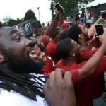 08/16/16: Foxborough, MA: After practice was over, Patriots running back LeGarrette Blount (left) obliged a group of football players from Dean College as he mugged it up behind them as they did a group selfie session. The New England Patriots and the Chicago Bears held a joint practice session in preparation for their NFL exhibition game Thursday night at Gillette Stadium. (Globe Staff Photo/Jim Davis) section: sports topic: Patriots 