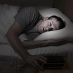 082116sleepdeprivation - Mature man, eyes wide open with hand on alarm clock, cannot sleep at night from insomnia. (iStock/Getty Images)