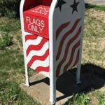 A mailbox in Newbury allows residents to drop off their old or damaged American flags to be disposed of in a proper manner. 