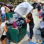 Family members and Boston University volunteers helped students move in to the West Campus dorms last year. 