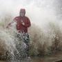 A news reporter doing a stand-up near a sea wall in Cedar Key, Fla., was covered by an unexpected wave as Hurricane Hermine neared the Florida coast on Thursday.