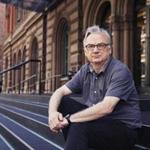 Playwright Richard Nelson in front of the Public Theater in New York.