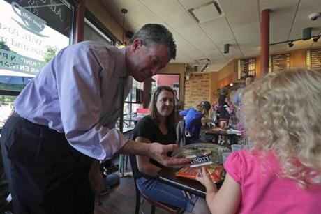 State Representative Walter Timilty of Milton, seeking to replace Brian Joyce in the state Senate, campaigned Friday at Angel?s Cafe in Sharon. Seven candidates are fighting to fill Timilty?s current seat.
