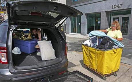 Christina Frawley helped her daughter Margaret move into temporary Boston University housing at 1047 Commonwealth Ave., recently renovated as 180 apartments.
