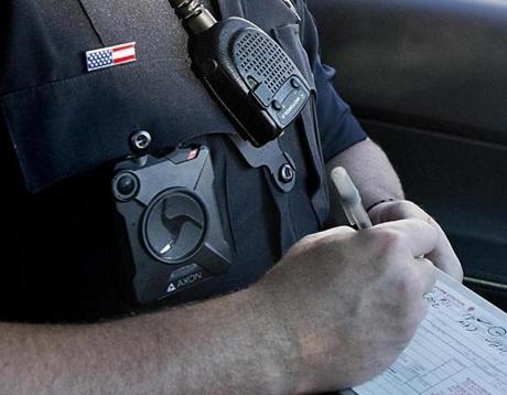 Methuen police officer nick Conway wrote a citation while wearing a body camera.  

