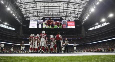 Arizona Cardinals players line up in NRG stadium during the second half of an NFL preseason football game against the Houston Texans, Sunday, Aug. 28, 2016, in Houston. (AP Photo/Jeff Roberson)

