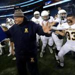 Foxborough, MA - 12/05/15 - (2nd half) Xaverian head coach Charles Stevenson and players begin the celebration as time ran out on Central Catholic. D1 Super Bowl: Central Catholic vs. Xaverian. - (Barry Chin/Globe Staff), Section: Sports, Reporter: Bob Holmes, Topic: 06Super Bowls, LOID: 8.2.665237068. 