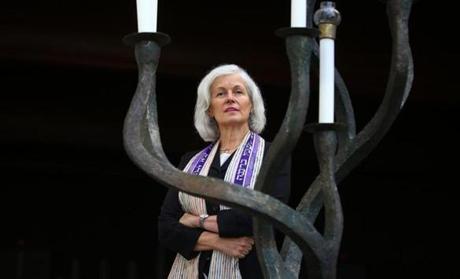 Boston, MA--8/30/2016--Rabbi Elaine Zecher (cq) is the first female senior rabbi at Temple Israel of Boston (cq). She is photographed in the sanctuary near the menorah, on Tuesday, August 30, 2016. Photo by Pat Greenhouse/Globe Staff Topic: 091116FirstZecher Reporter: XXX
