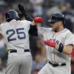 Boston Red Sox's Travis Shaw, right, celebrates with teammate Jackie Bradley Jr., left, after hitting a two-run home run hit against the San Diego Padres during the second inning of a baseball game Wednesday, Sept. 7, 2016, in San Diego. (AP Photo/Gregory Bull)