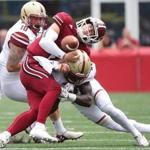 Foxborough MA 9/10/16 Boston College Isaac Yiadom forcing UMass Amherst quarterback Ross Comis to fumble during second quarter action at Gillette Stadium on Saturday September 10, 2016. (Photo by Matthew J. Lee/Globe staff) 