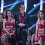 In this photo provided by ABC, Cheryl Burke, left, and Ryan Lochte, center, appear on 