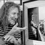 Visiting Peter Simon?s gallery on Martha?s Vineyard, Led Zeppelin singer Robert Plant checks out a picture Simon took of him in 1975. 
