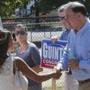 US Representative Frank Guinta greets voters at a polling station on Tuesday in Manchester, N.H. 