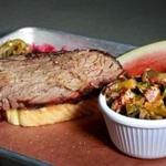 Brisket with collards and pimento mac and cheese at the Smoke Shop. 
