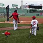 Boston, Ma-June 3, 2016-globe staff photo by Stan Grossfeld--Red Sox first baseman Hanley Ramirez and his son Hansel Ramirez during pregame at Fenway Park