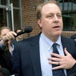 Reporters surrounded Curt Schilling as he left the Rhode Island Economic Development Corporation headquarters in Providence, Rhode Island, in 2012. 
