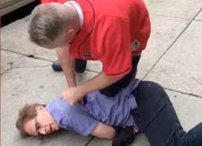 A video recorded in May showed Officer Edward P. Barrett on top of a pedestrian with his knee on the man?s back.
