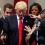 Members of the clergy prayed over Republican presidential nominee Donald Trump at the New Spirit Revival Center in Cleveland Heights, Ohio.