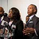 Tiffany Crutcher, the twin sister of Terence Crutcher, with the Rev. Al Sharpton during a news conference Wednesday.