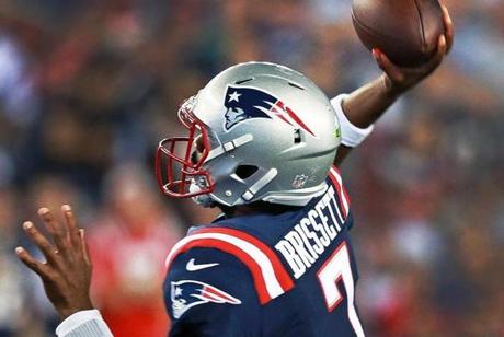 09/22/16: Foxborough, MA: A smiling Patriots quarterback Jacoby Brissett (7,right) is pictured as he leaves the field with teammate Devin McCourty (32, left) following New England's 27-0 victory over the Houston Texans. The New England Patriots hosted the Houston Texans in a Thursday night NFL regular season football game. (Globe Staff Photo/Jim Davis) section: sports topic: Patriots-Texans 

