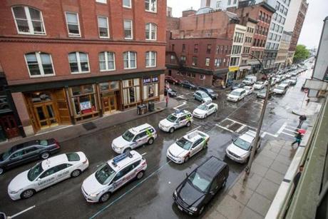 Taxi drivers protested near Uber headquarters in Boston in 2014. 
