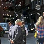 BOSTON, MA - 9/26/2016: RAINING BUBBLES at an outdoor exhibit on The Rose Kennedy Greenway presented by Architects in partnership with HUBweek and The Mayorâ??s Office of Arts and Culture and The Mayorâ??s Housing Innovation Lab and Imagine Boston 2030 and John Moriarty & Associates and The Rose Kennedy Greenway Conservancy and Boston Society of Architects/AIA (David L Ryan/Globe Staff Photo) SECTION: METRO TOPICstand alone photo