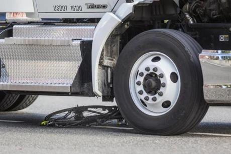 A bicycle was seen underneath a tractor trailer at the scene of a fatal accident in Cambridge.
