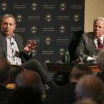The Walt Disney Company's CEO Robert Iger speaks with New England Patriots owner Robert Kraft during a talk hosted by the Boston College CEO Club in Boston.