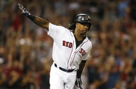 Boston, MA - 9/18/2016 - Boston Red Sox Hanley Ramirez reacts as he rounds the bases on his three run home run against the Yankees during the fifth inning at Fenway Park in Boston, MA, September 18, 2016. (Jessica Rinaldi/Globe Staff) Topic: RedSox-Yankees 
