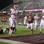 Chestnut Hill MA 10/7/16 Clemson Tigers quarterback Deshaun Watson scoring a rushing touchdown gliding into the end zone leaving Boston College Eagles in his wake during first half action at Alumni Stadium on Friday October 7, 2016. (Photo by Matthew J. Lee/Globe staff) 